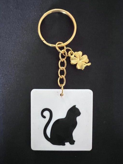 Porte clé chat assis