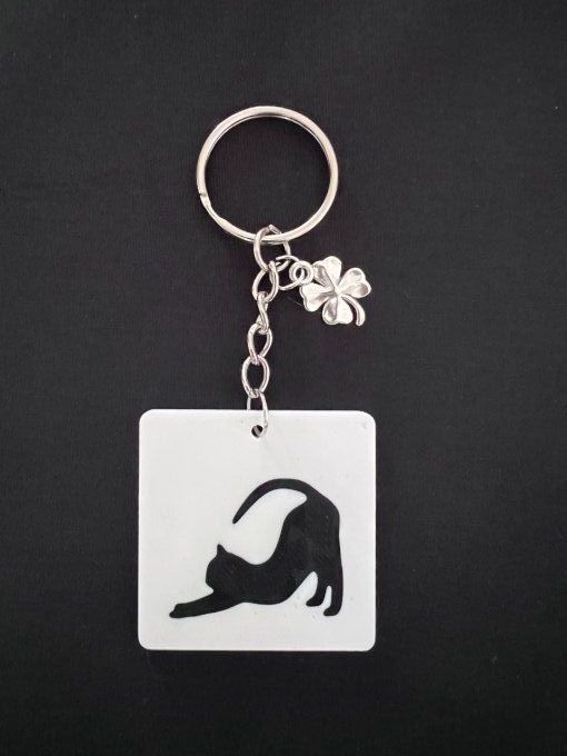 Porte clé chat qui s'étire
